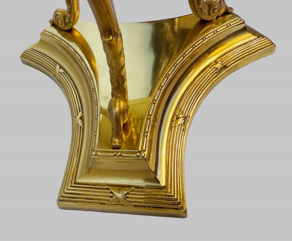 An antique French gilt bronze centrepiece with a pierced metal rim, tri-form base, and scalloped cut glass insert. View III