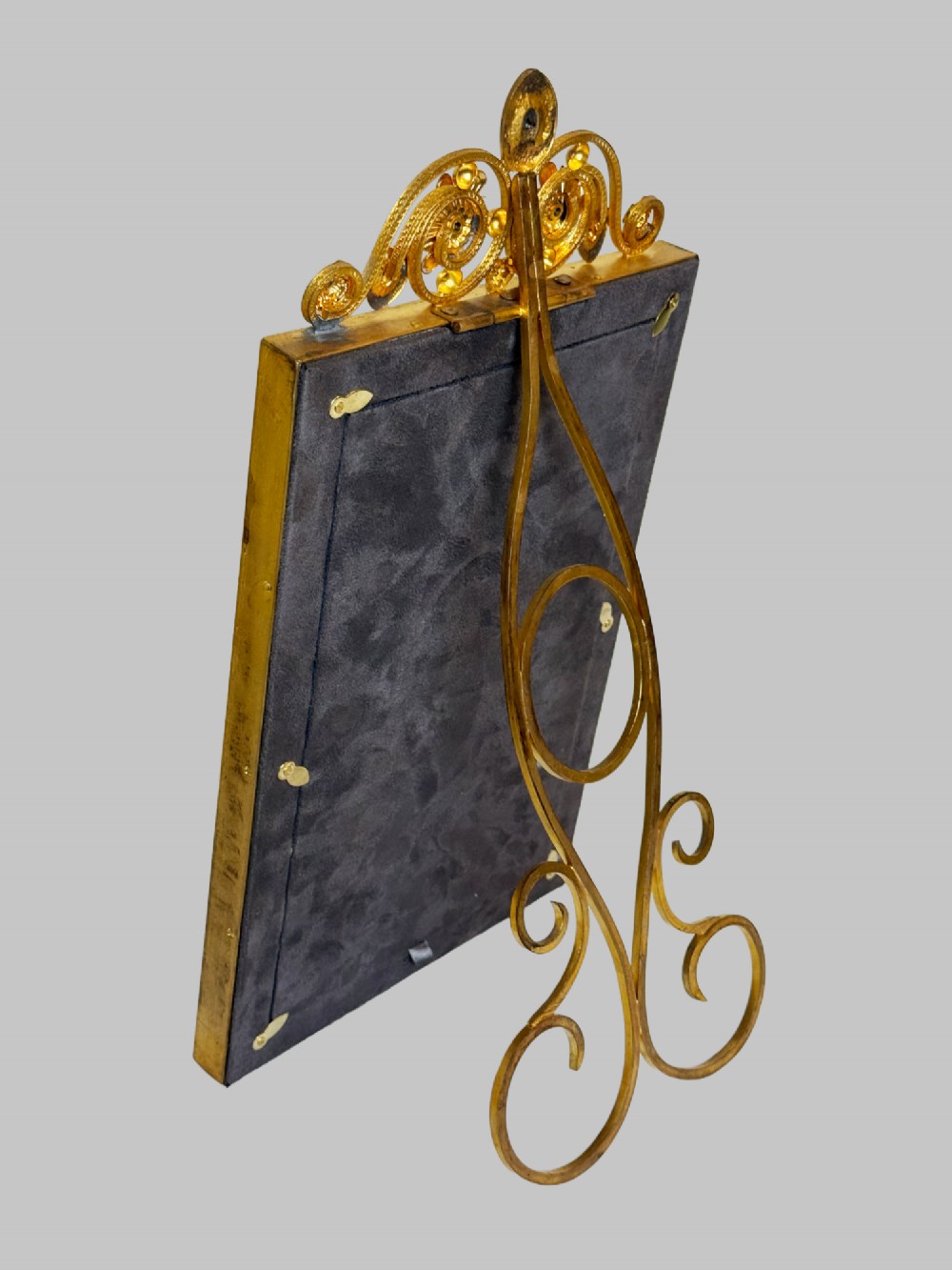 A rectangular gilt bronze picture frame featuring a blue velvet border, ornate corner mounts, and an elaborate floral crest at the top. View III