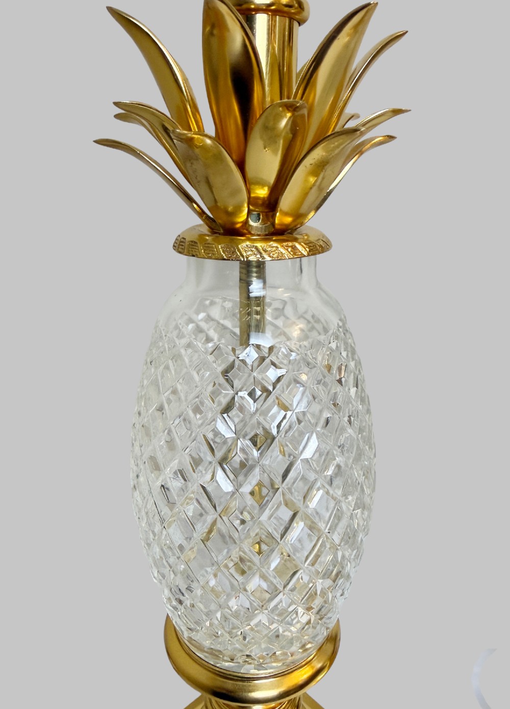 A pair of French gilt bronze and cut crystal table lamps designed in the shape of pineapples on square stepped bases. View III