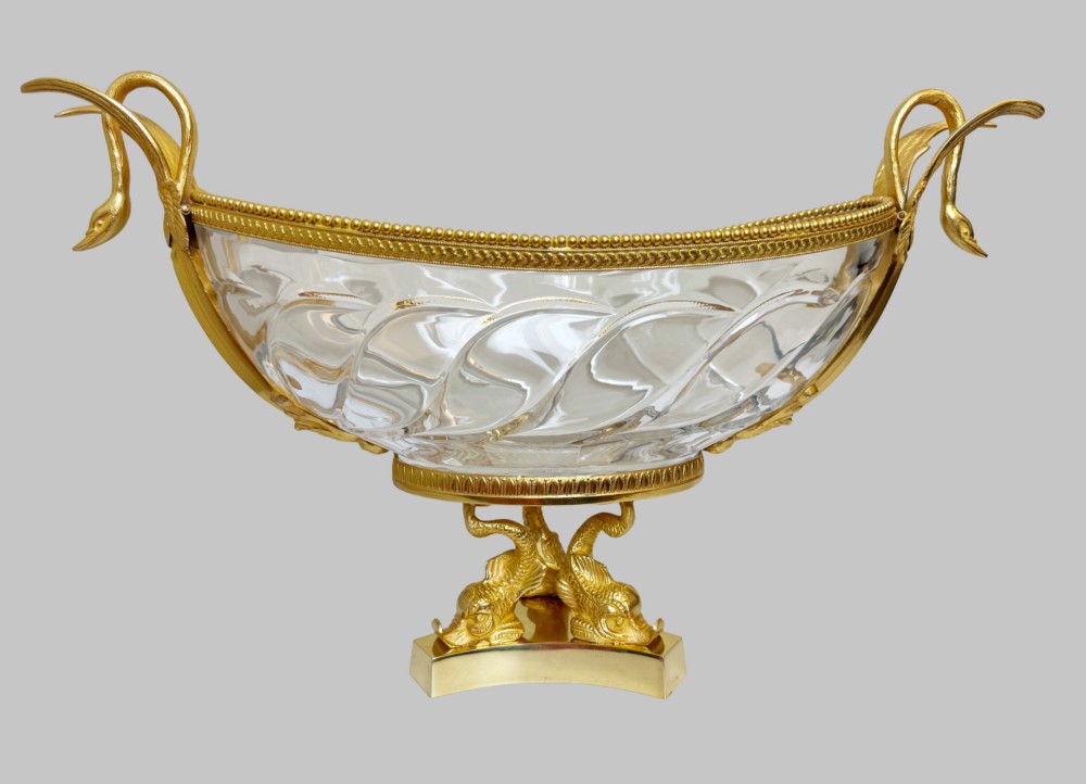 A 19th-century boat-shaped cut-crystal bowl with gilt-bronze swan-form handles and a pedestal base supported by gilt dolphins. View VIII