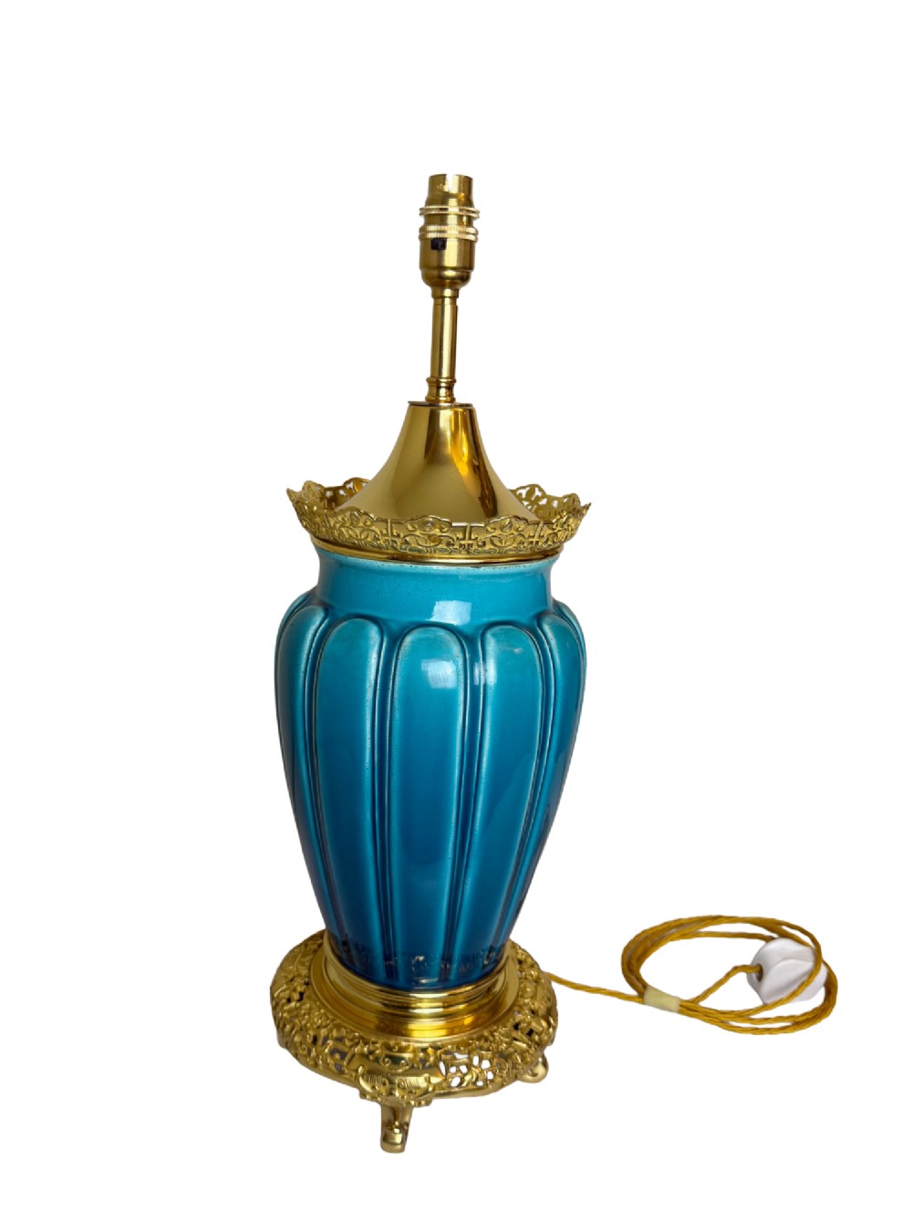 A 19th-century turquoise blue fluted porcelain table lamp with pierced gilt bronze base and collar trim.