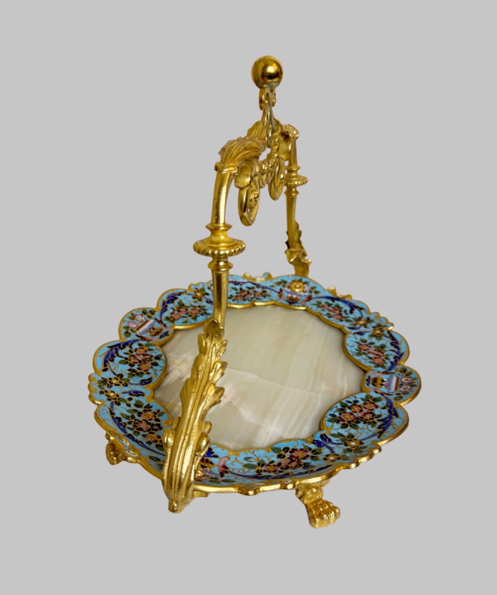 An antique French gilt bronze centrepiece tray featuring a scalloped rim with light blue floral champleve enamel work, an onyx inset base, and an ornate scroll handle. View II