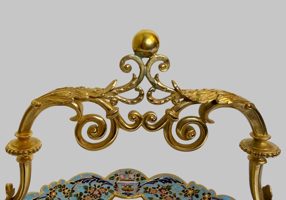 An antique French gilt bronze centrepiece tray featuring a scalloped rim with light blue floral champleve enamel work, an onyx inset base, and an ornate scroll handle. View IV