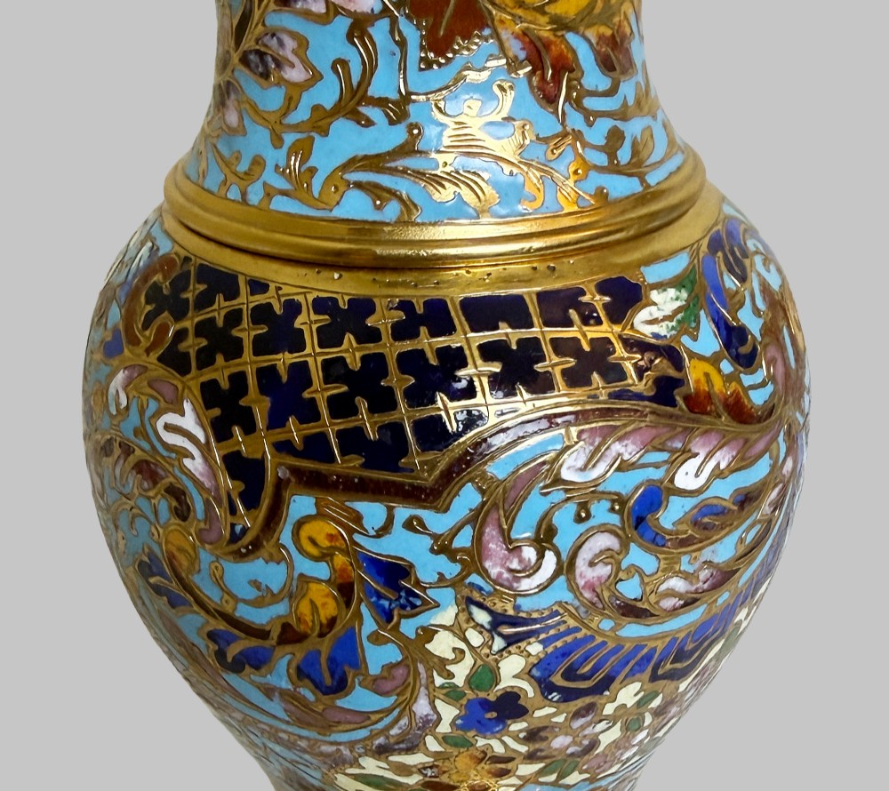 A pair of 19th-century French gilt bronze urn-shaped vases decorated with intricate turquoise and polychrome champleve enamel scrollwork. View VI