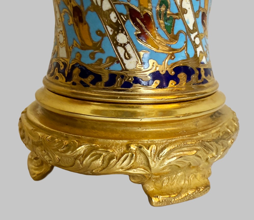A pair of 19th-century French gilt bronze urn-shaped vases decorated with intricate turquoise and polychrome champleve enamel scrollwork. View VII