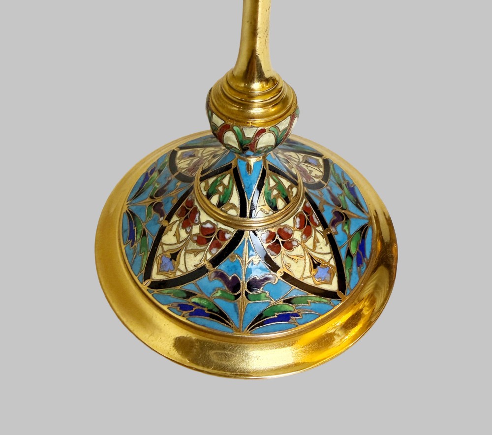 A 19th-century gilt bronze tazza featuring polychrome champleve enamel inlay across the shallow dish, pedestal foot, and side handles. View V