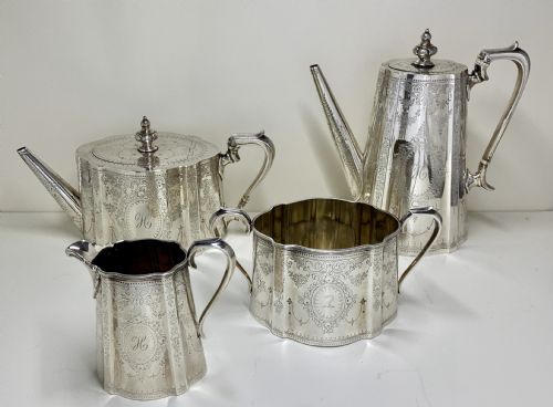 1873 A HIGHLY ENGRAVED VICTORIAN STERLING SILVER TEA COFFEE SERVICE - ADDITIONAL PHOTO 1