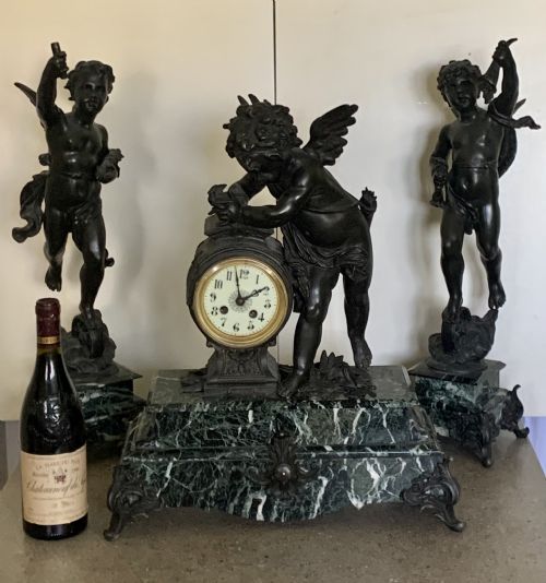 A MONUMENTAL CHERUB CLOCK SET IN BRONZED METAL CIRCA 19TH CENTURY - ADDITIONAL PHOTO 8
