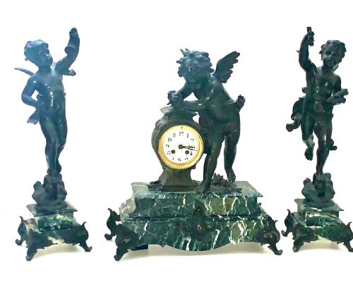 a monumental cherub clock set in bronzed metal circa 19th century - CATEGORY: ANTIQUE CLOCKS - DATED VICTORIAN