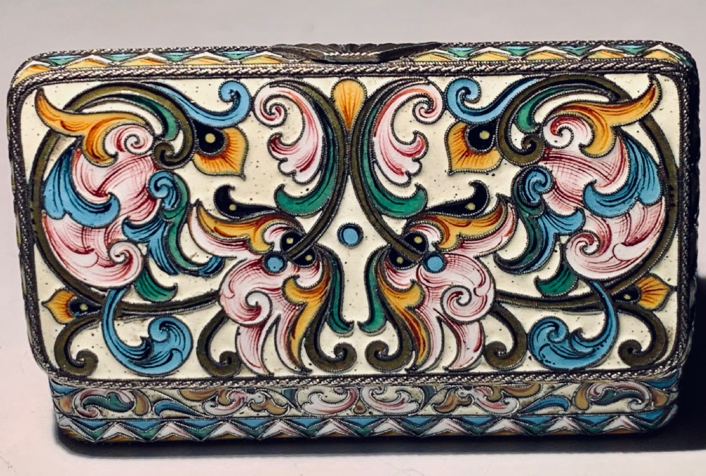 A rectangular Imperial Russian silver-gilt box decorated with floral multi-coloured shaded enamel over a cream background. View XIII