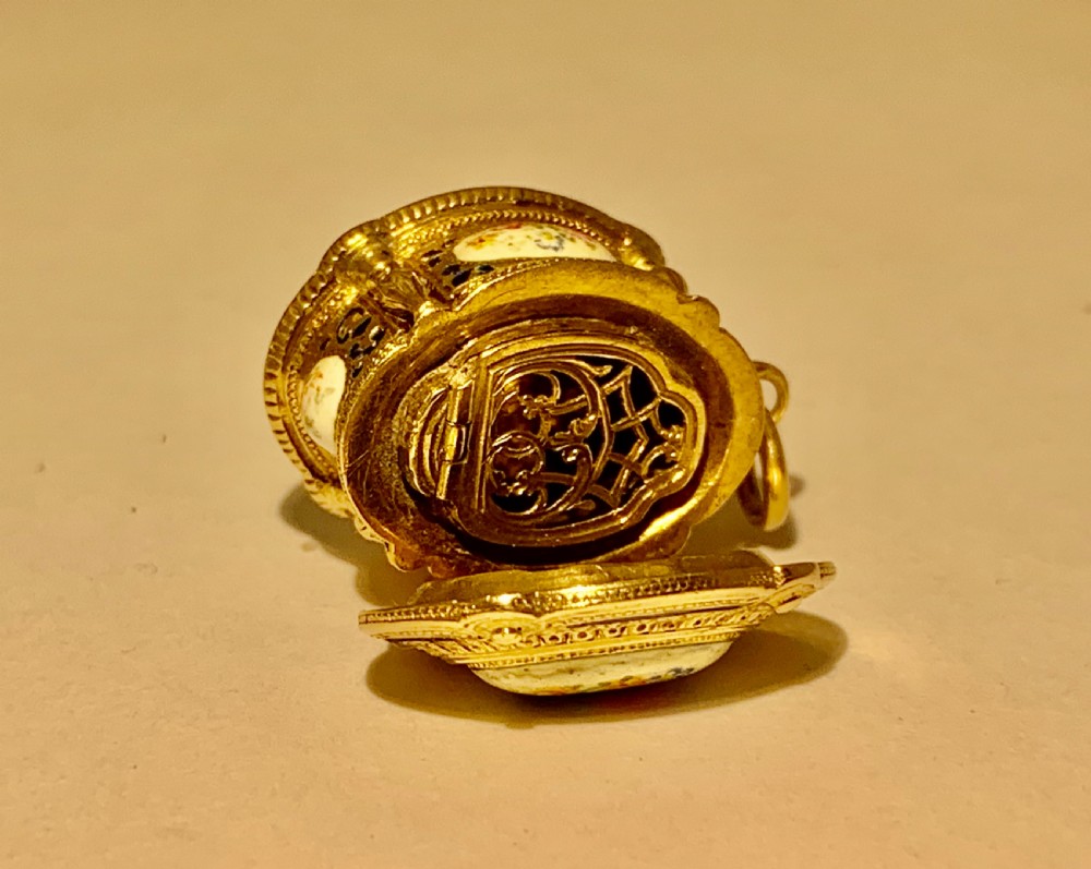 A GOLD AND ENAMEL VINAIGRETTE BOX PENDANT CHARM. View VII
