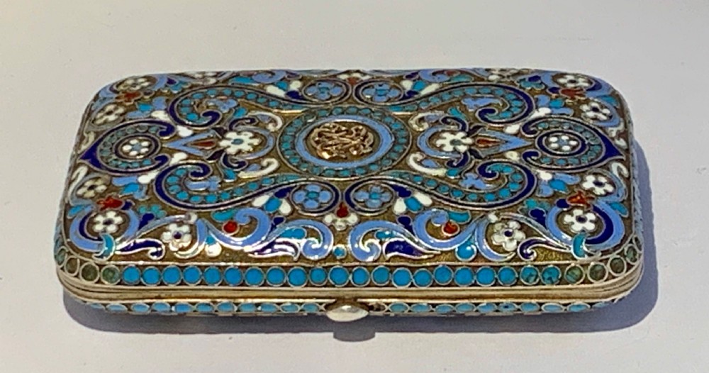 A rectangular silver-gilt box decorated with blue, white, and turquoise cloisonne enamel scroll motifs. View II
