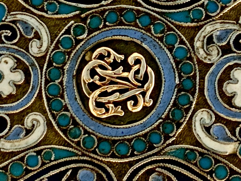 A rectangular silver-gilt box decorated with blue, white, and turquoise cloisonne enamel scroll motifs. View IV