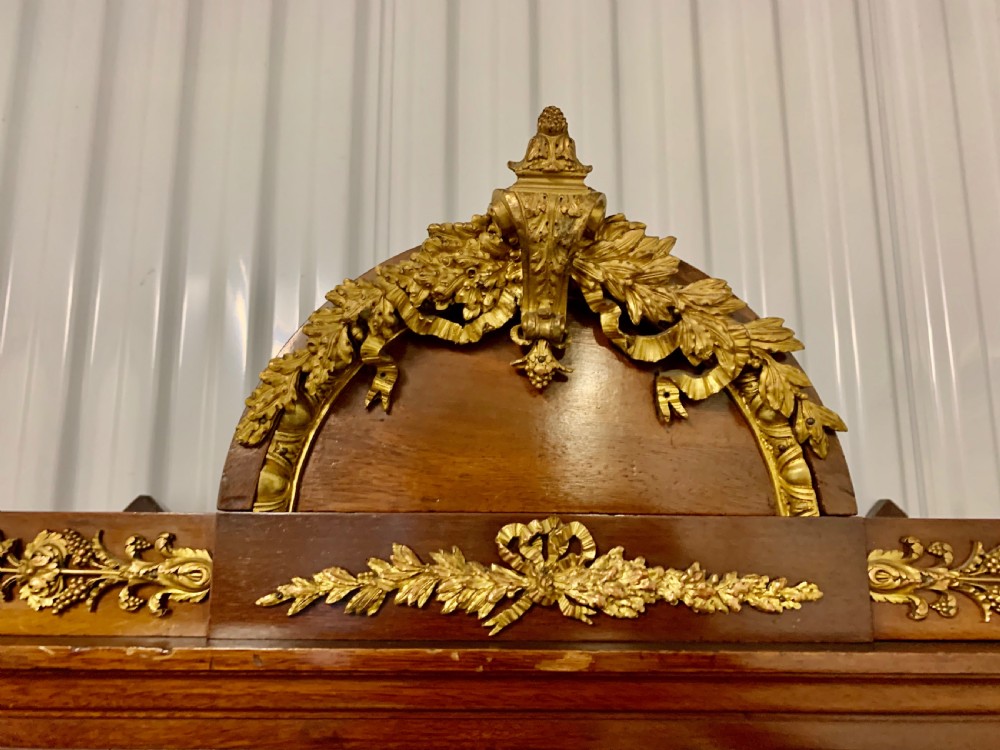 A FRENCH ORMOLU-MOUNTED MAHOGANY AND PARQUETRY VITRINE-ON-STAND View III