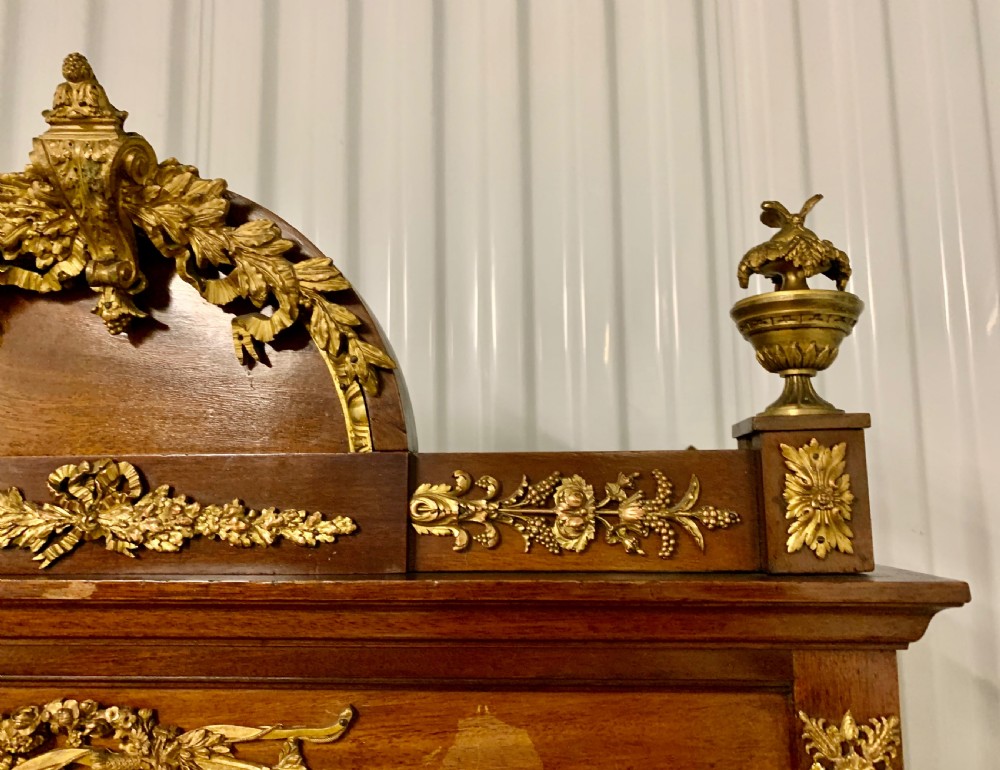 A FRENCH ORMOLU-MOUNTED MAHOGANY AND PARQUETRY VITRINE-ON-STAND View V