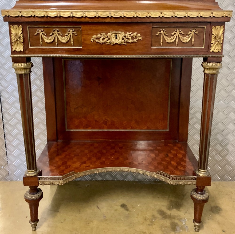 A FRENCH ORMOLU-MOUNTED MAHOGANY AND PARQUETRY VITRINE-ON-STAND View X