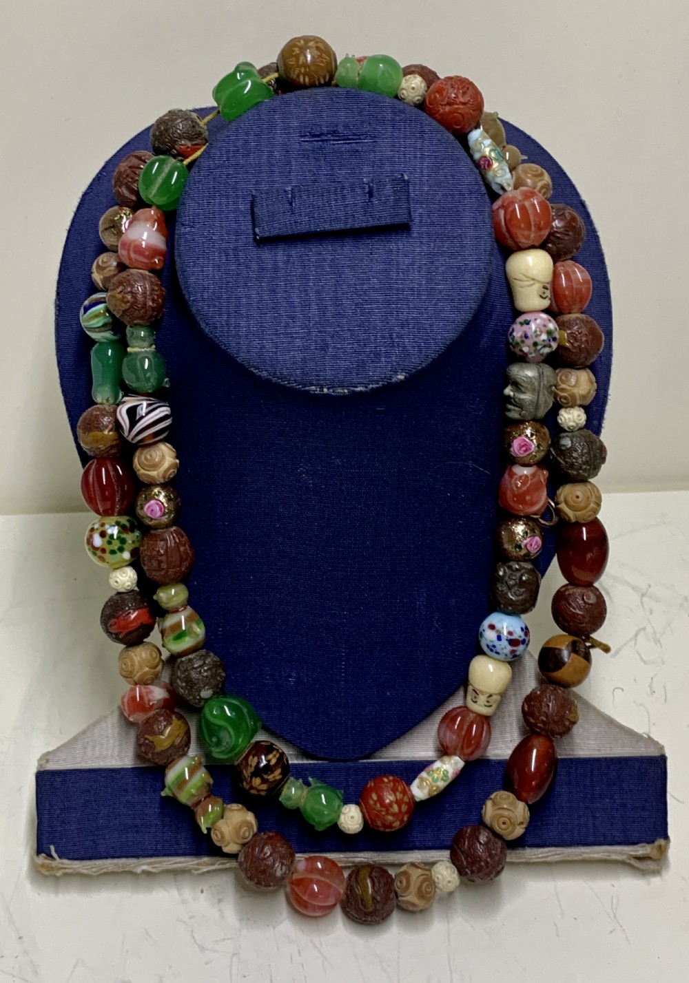A  Necklace of 75 ojime beads, Japan, part Meiji period (1868-1912