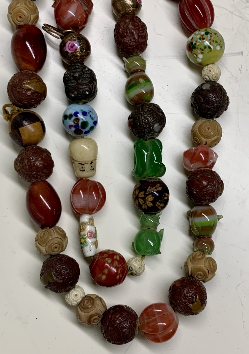 A  Necklace of 75 ojime beads, Japan, part Meiji period (1868-1912 View V