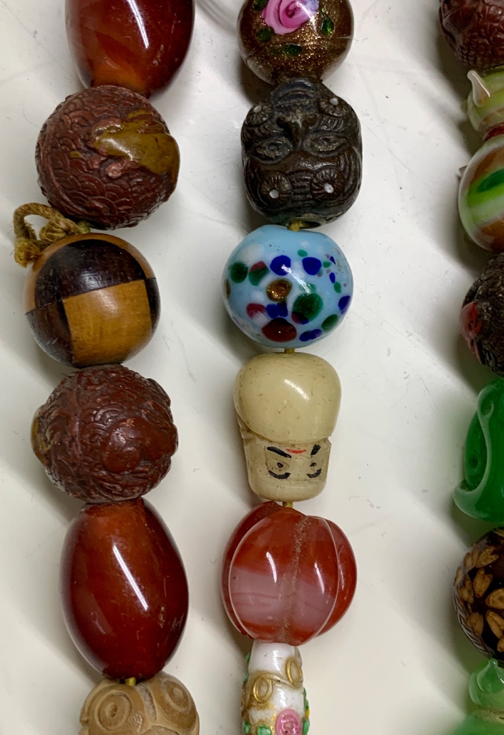 A  Necklace of 75 ojime beads, Japan, part Meiji period (1868-1912 View VIII