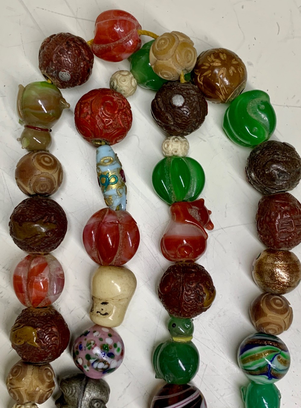 A  Necklace of 75 ojime beads, Japan, part Meiji period (1868-1912 View X