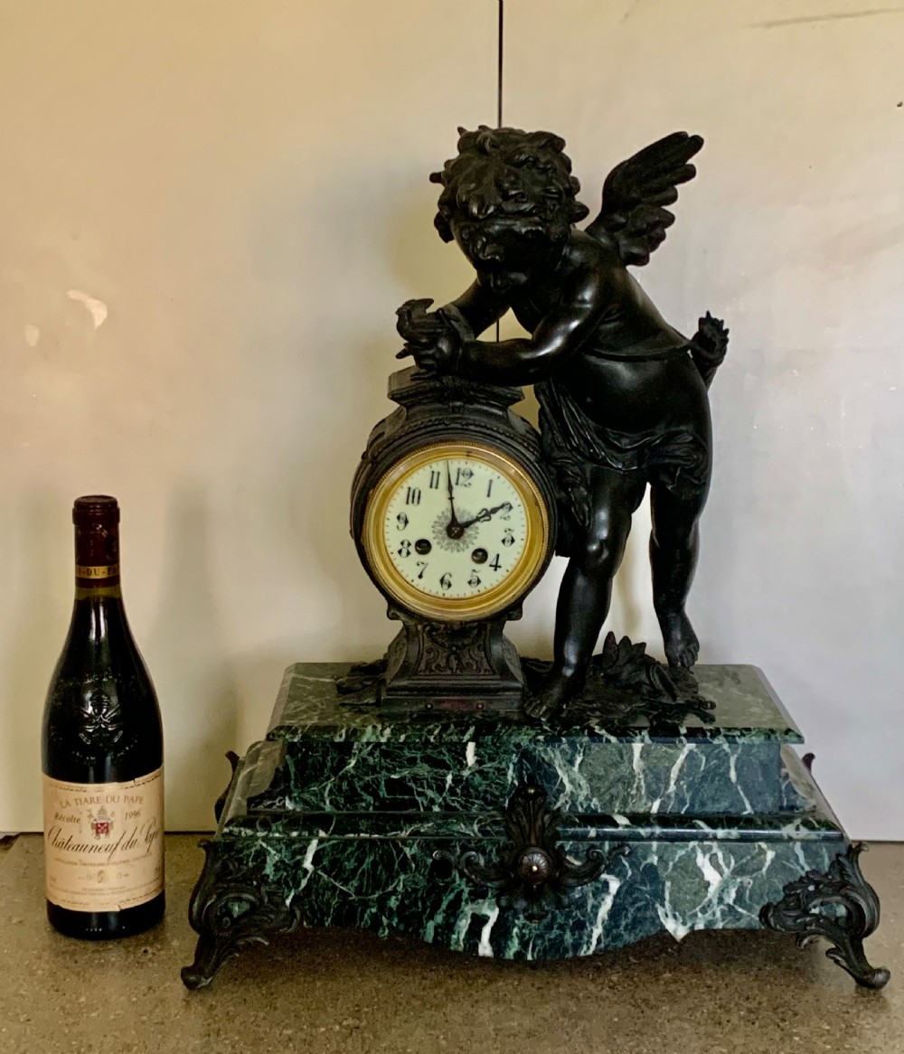 A Monumental Cherub Clock Set in Bronzed Metal Circa 19th Century View II