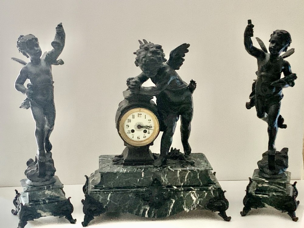 A Monumental Cherub Clock Set in Bronzed Metal Circa 19th Century View VII