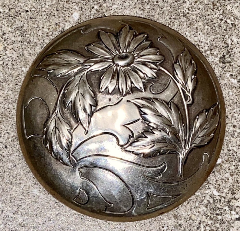 An Art Nouveau green cameo glass bowl featuring etched yellow floral enamelling and a chased silver cover. View XVIII