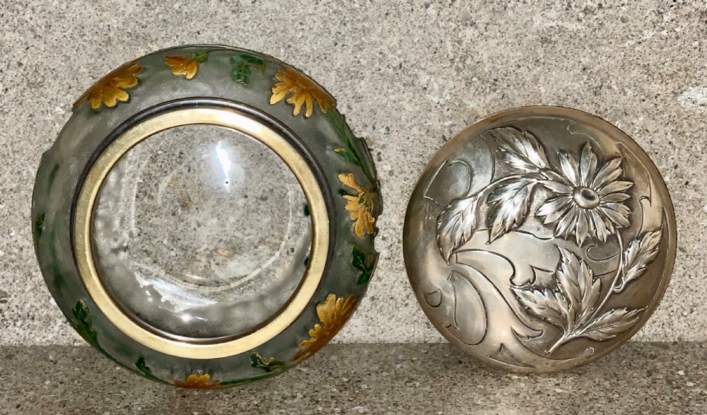 An Art Nouveau green cameo glass bowl featuring etched yellow floral enamelling and a chased silver cover. View IV