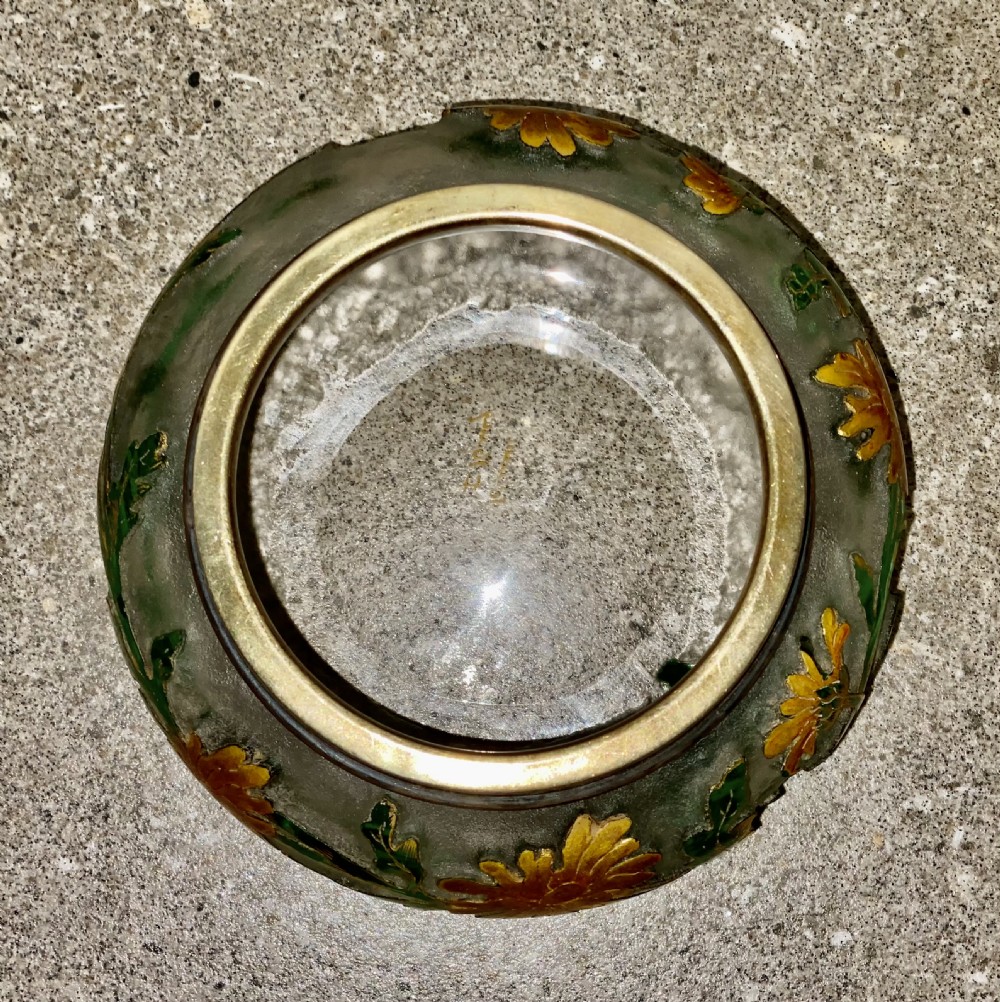 An Art Nouveau green cameo glass bowl featuring etched yellow floral enamelling and a chased silver cover. View VIII