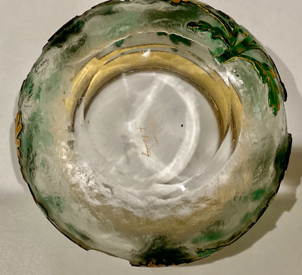 An Art Nouveau green cameo glass bowl featuring etched yellow floral enamelling and a chased silver cover. View XII
