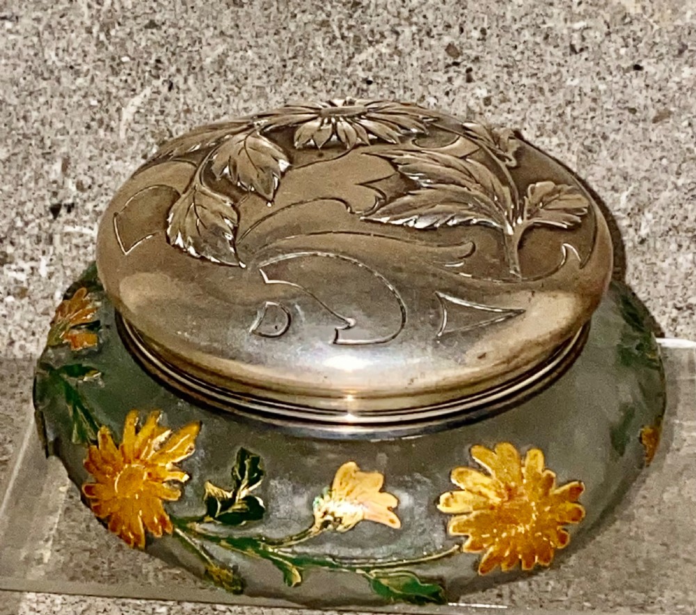 An Art Nouveau green cameo glass bowl featuring etched yellow floral enamelling and a chased silver cover. View XVI