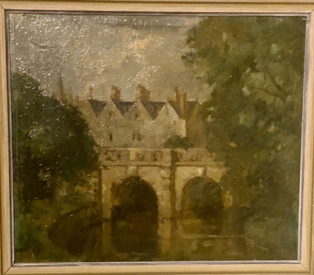 A framed oil painting on board depicting Magdalene Bridge in Oxford, featuring stone arches over water surrounded by trees and classical architecture. View VII