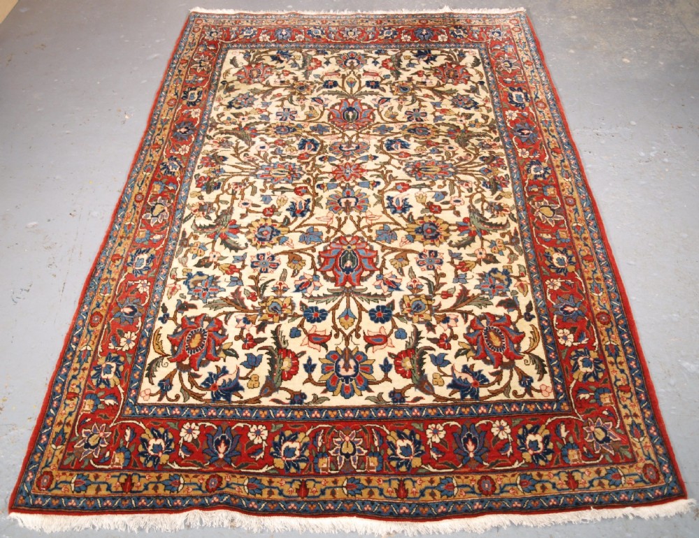 ANTIQUE QUM RUG WITH ALL OVER FLORAL DESIGN, EXCELLENT COLOURS, CIRCA 1920.