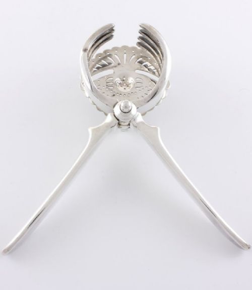 Silver Plate Lemon Juicer.