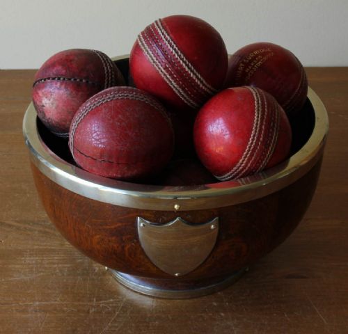 Silver Plated Trophy Bowl with 12 Leather Cricket Balls.