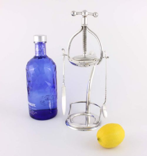 fig 1. Silver Plated Lemon Squeezer.