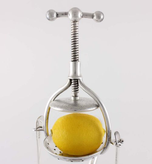 fig 2. Silver Plated Lemon Squeezer.