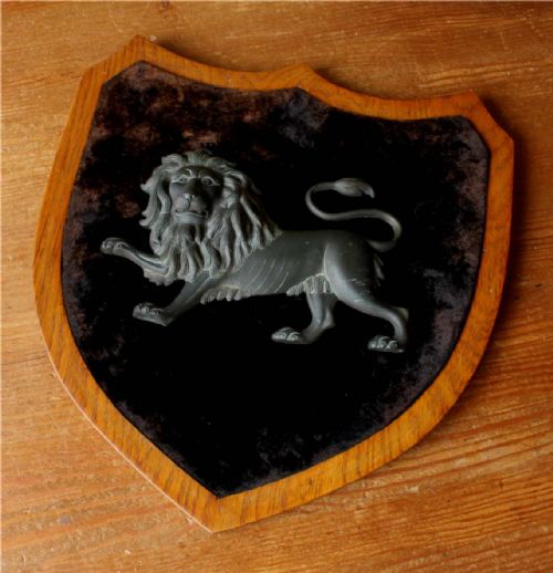 Antique Bronze Lion on Oak Shield.