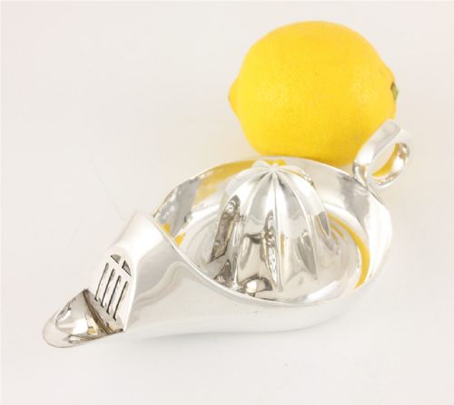 fig 1. Art Deco Silver Plate Lemon Squeezer.