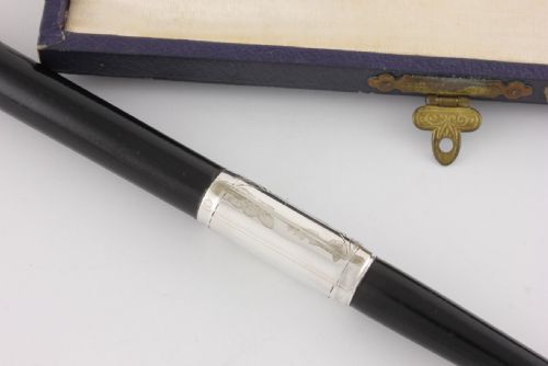 fig 1. Silver & Ebony Two Piece Pocket Conductor's Baton In Fitted Case. 1942.