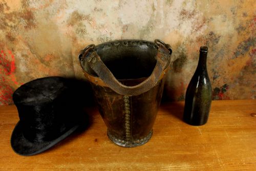 fig 1. Antique Leather Fire Bucket. Hepburn and Gale Studded Paper Basket.
