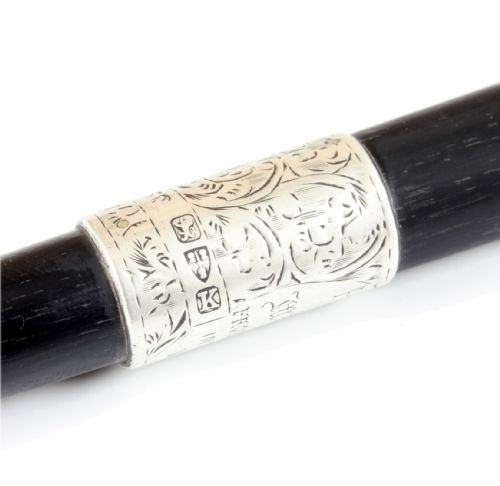 fig 1. A Victorian tapered black ebony conductor baton fitted with silver cap, centre band, and tip mounts.