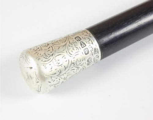 fig 2. A Victorian tapered black ebony conductor baton fitted with silver cap, centre band, and tip mounts.