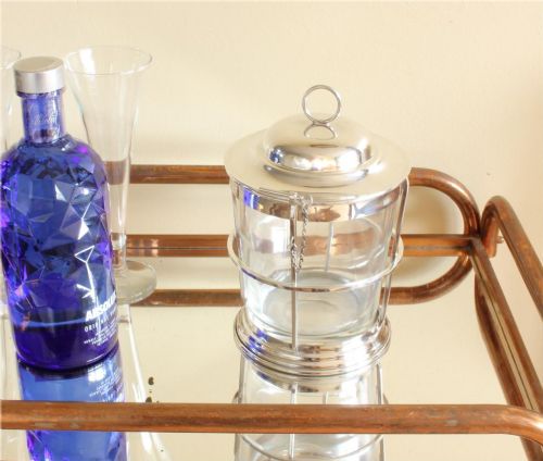 A silver-plated and clear glass ice bucket designed in the form of a nautical ships lantern with a removable lid and chain detail. View XIV