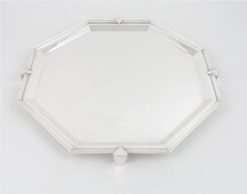 fig 2. An octagonal silver-plated Art Deco cocktail tray featuring geometric corner accents and a polished smooth surface.