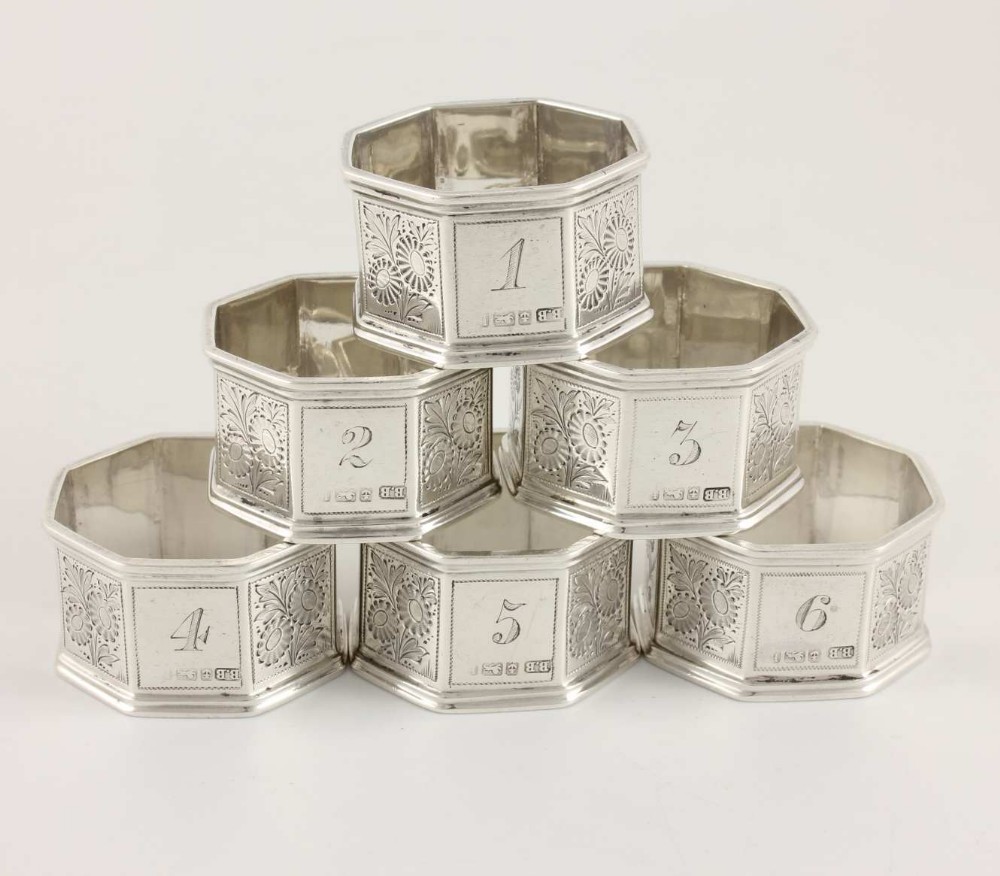 Six Octagonal Solid Silver Numbered Napkin Rings.