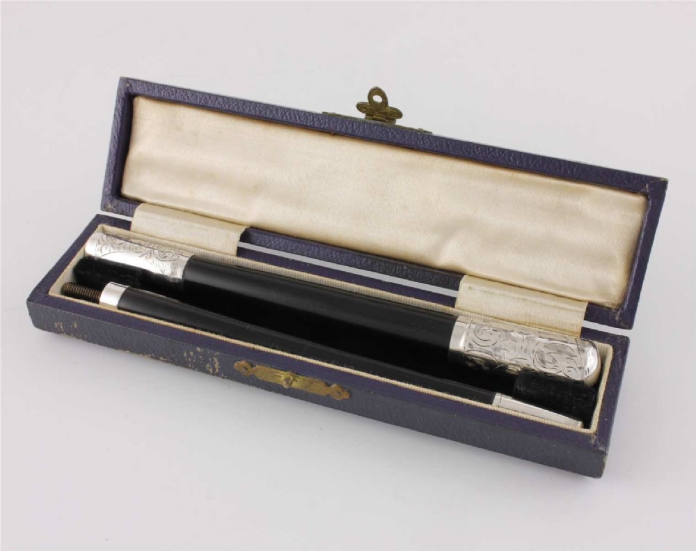 Silver & Ebony Two Piece Pocket Conductor's Baton In Fitted Case. 1942.