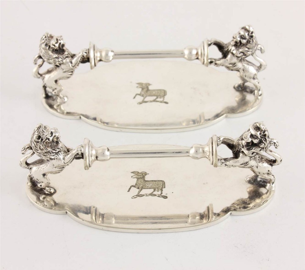 Pair Of Silver Plate Rampant Lion Knife Rests.