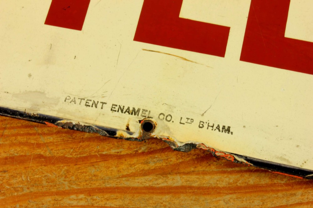 An antique rectangular off-white vitreous enamel sign displaying bold burgundy typography reading GENTLEMEN with patinated edges. View IX