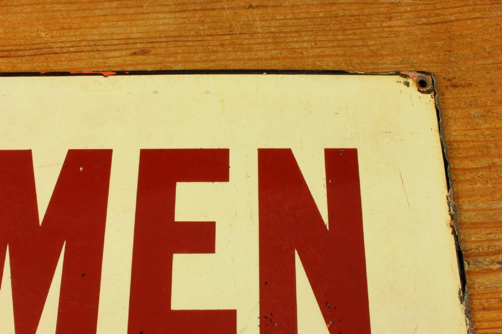 An antique rectangular off-white vitreous enamel sign displaying bold burgundy typography reading GENTLEMEN with patinated edges. View XV